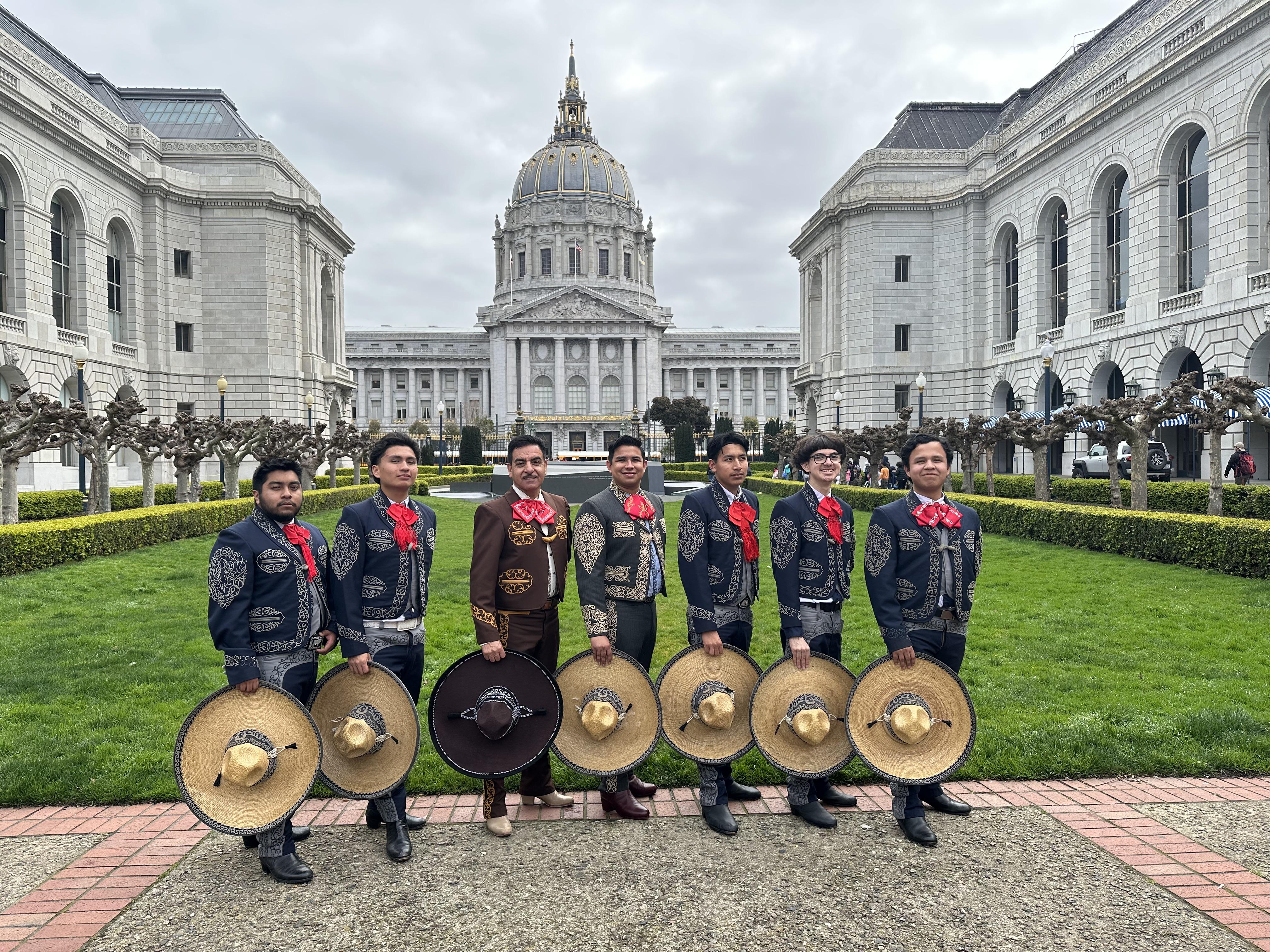 Students of South San Francisco High School's Ballet Folklórico Alma de México program pose in front of San Francisco City Hall on March 20, 2023, before performing at the War Memorial Opera House as part of San Francisco Unified School District's annual Children's Day celebration.