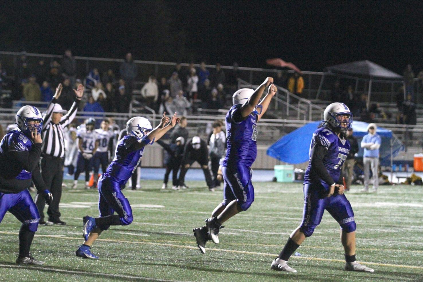 South City players celebrate their go-ahead touchdown with 10 seconds to play as the third-seeded Warriors topped No. 7 Leland, 11-9, in the CCS Division V semifinals. (Source: Nathan Mollat, San Mateo Daily Journal)
